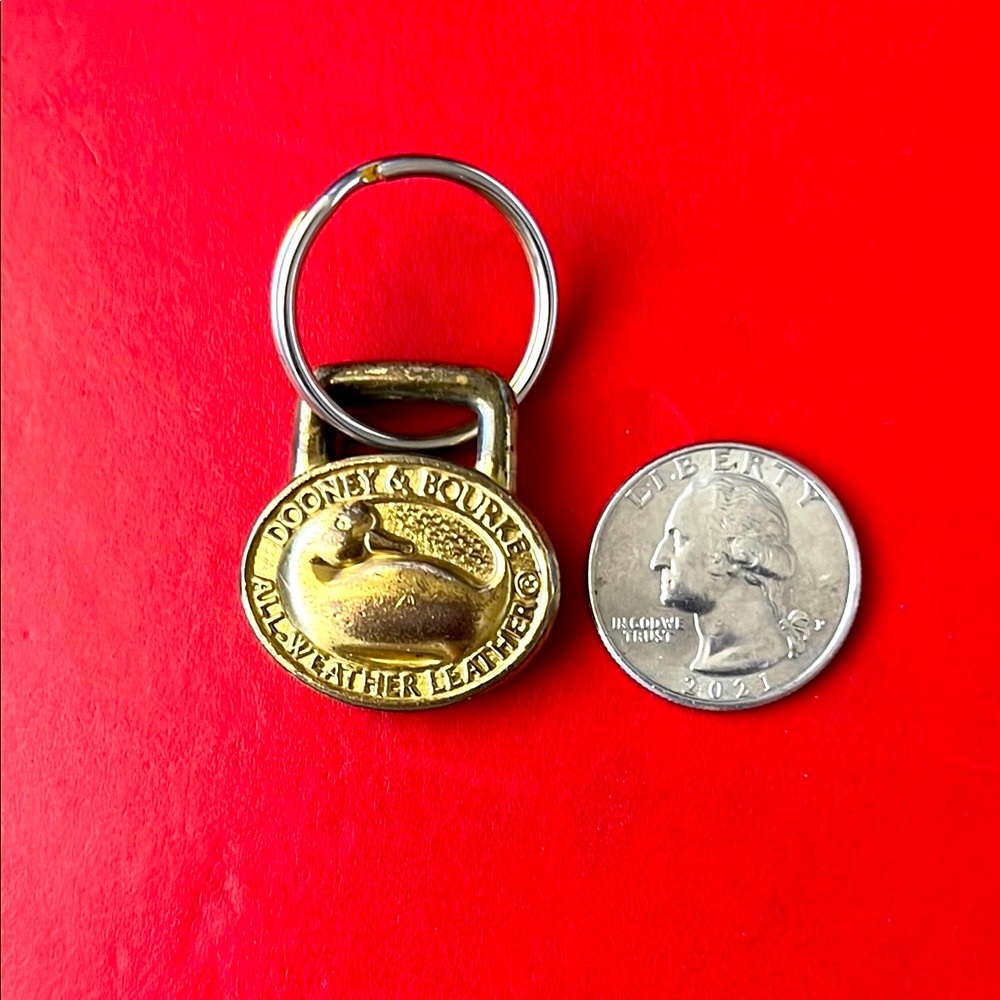 Dooney & Bourke Vintage Hangtag Gold Charm for Bags (pre owned)